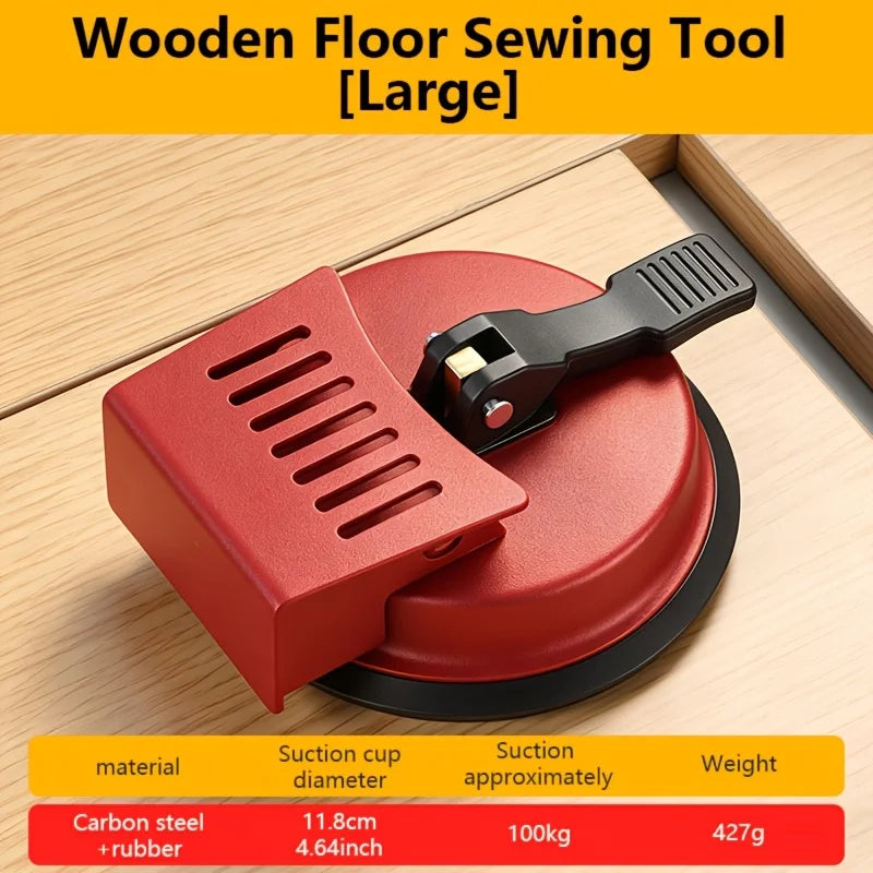 A large red wooden floor sewing tool with a suction cup is shown on a light wood surface.