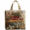 A vintage quilted tote bag featuring a vertical stack of old books and floral embroidery on a cream background.