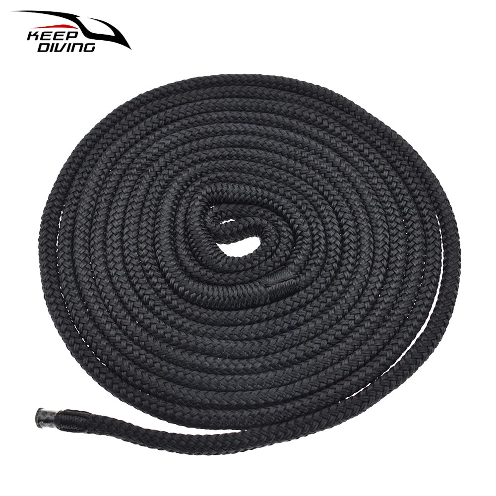Black double braid nylon dock lines coiled and laid out for boating use