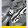 Close-up of a chrome-vanadium steel socket set and ratchet handle on a tool.
