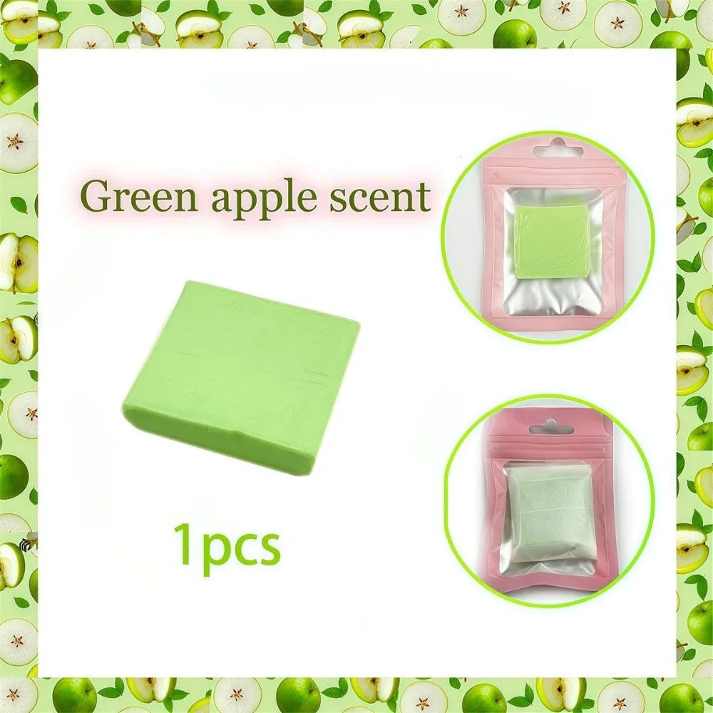 A lime green silicone clay block and a packaged square of the same color for scenting or diamond painting.
