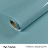 Roll of Grey Green Glitter peel-and-stick vinyl contact paper shown from the side.