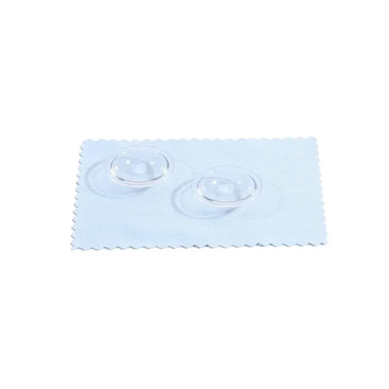 A clear plastic lens protector for a car camera, featuring two circular covers.