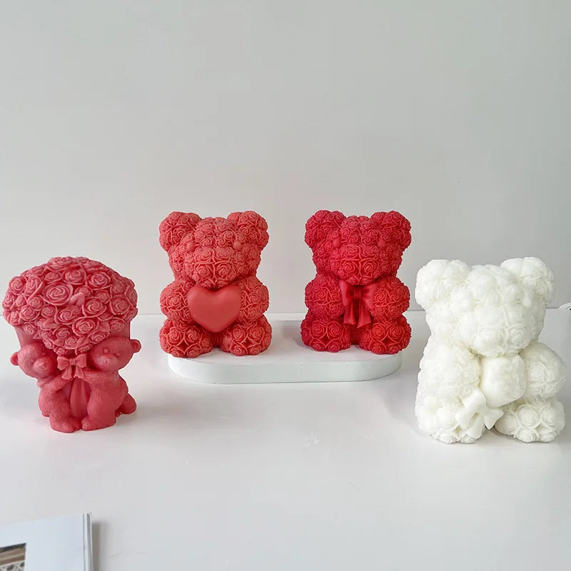 Three silicone bear molds in pink and white colors for crafting candles, soap, and resin