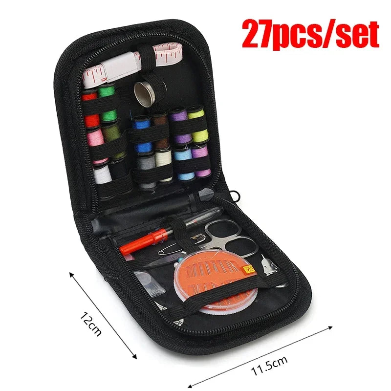 A black compact portable sewing kit set containing various needles, pins, and small tools.