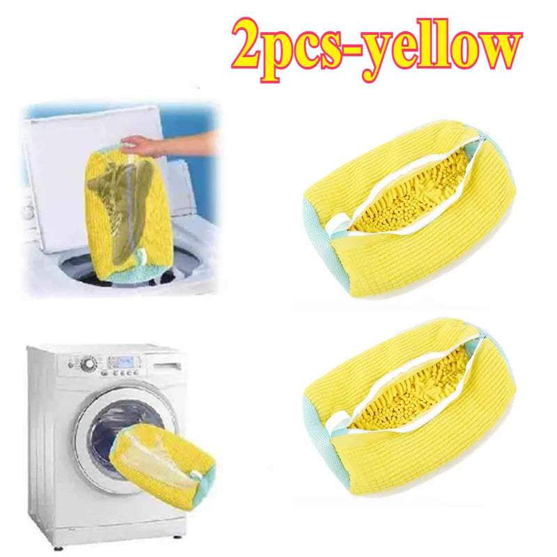 Two yellow reusable shoe washing bags shown in context with a washing machine.