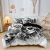 A black and white duvet cover featuring a detailed sugar skull design with floral accents.