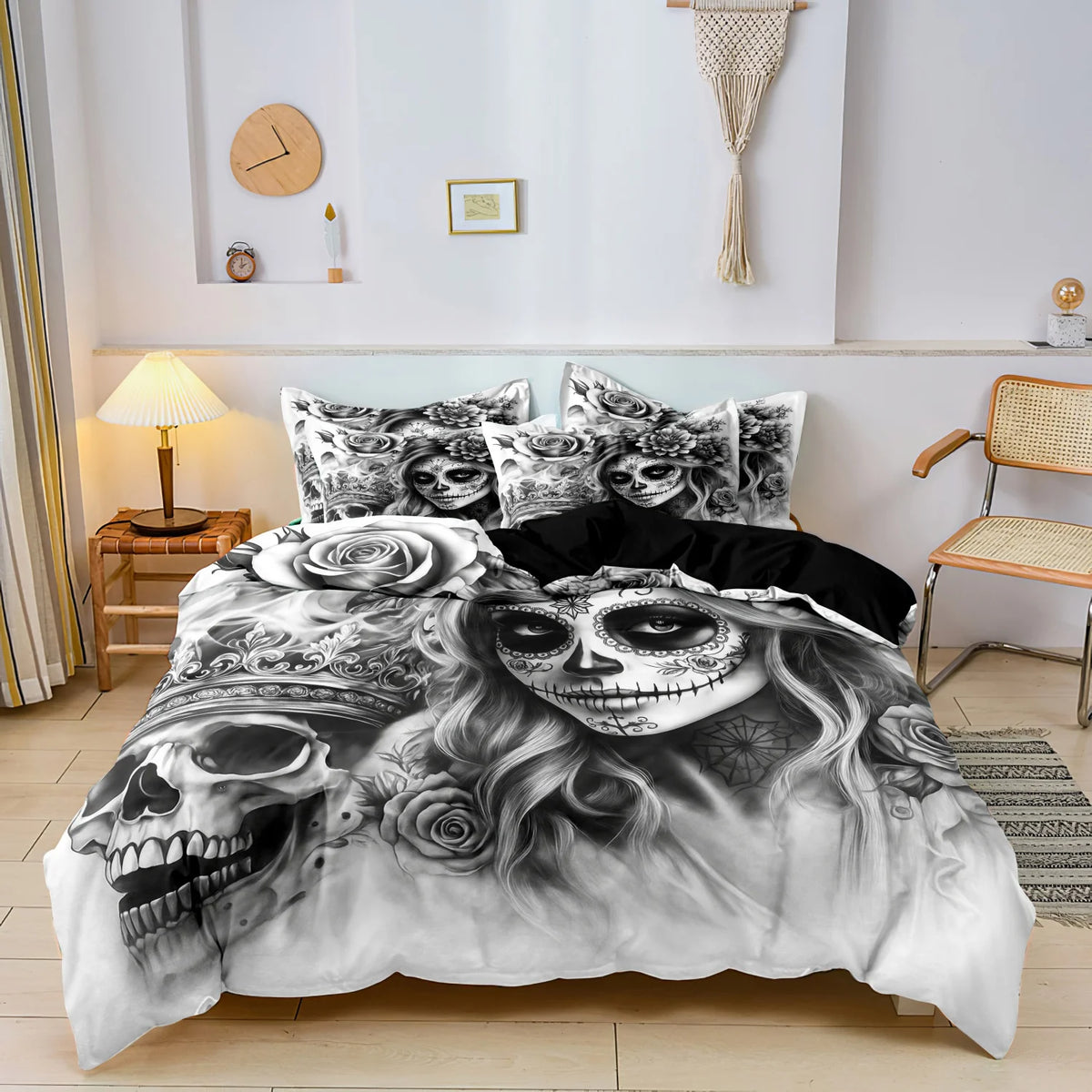 A black and white duvet cover featuring a detailed sugar skull design with floral accents.