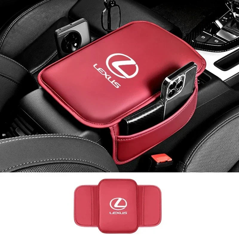 A red PU leather car armrest cover with a storage bag and phone holder for Lexus models.