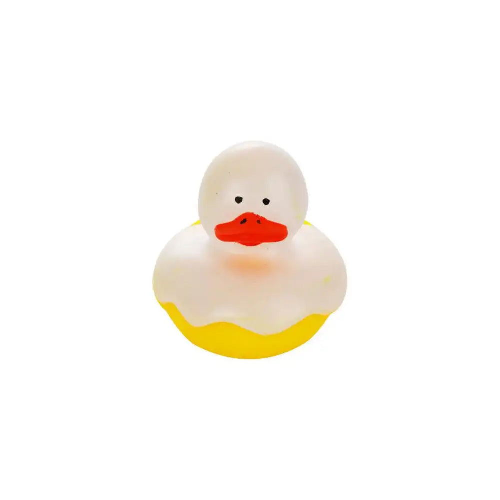 A white rubber duck bath toy with an orange beak and yellow belly.