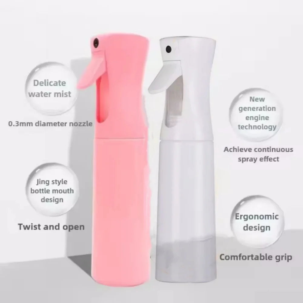 A pink and white refillable mist spray bottle with a delicate nozzle and ergonomic design.
