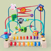 A wooden bead maze roller coaster toy featuring colorful beads and an abacus counter.