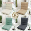 A collection of foldable floor sofa covers in beige, light green, and dark gray fabric displayed on chairs.