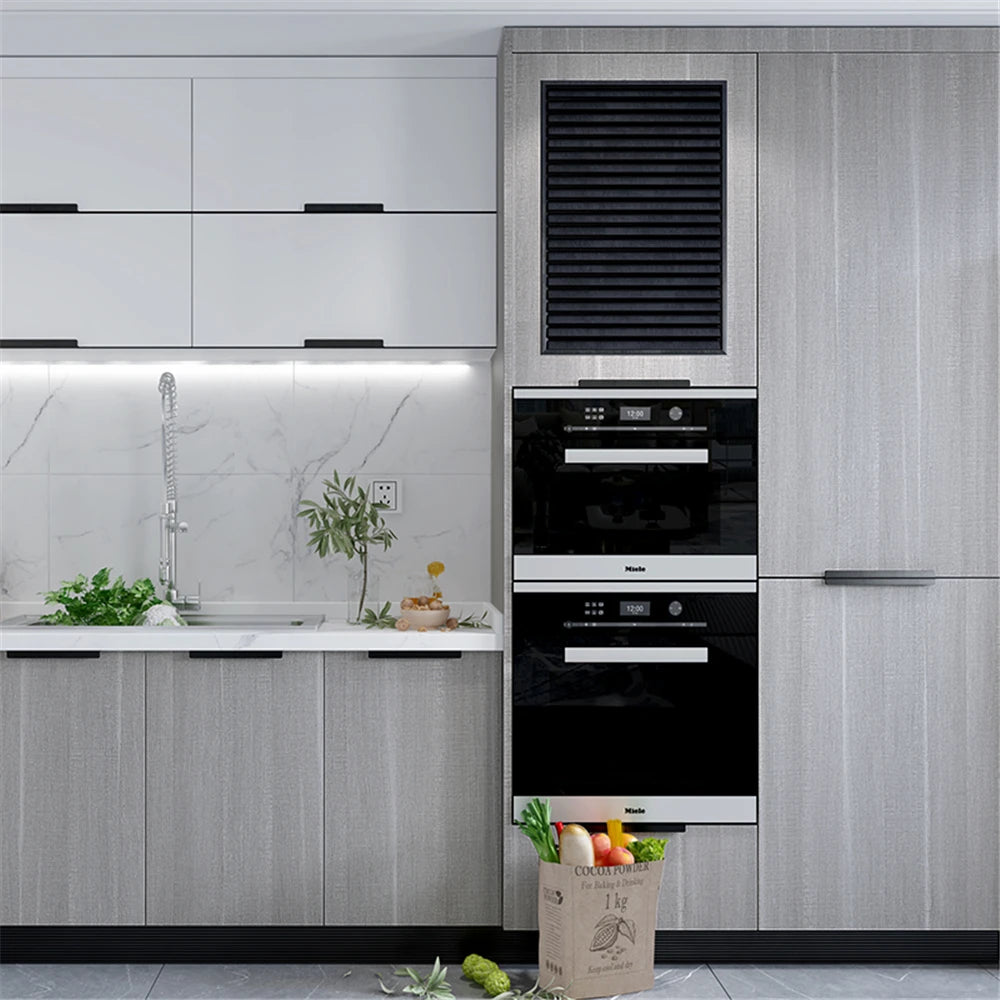 Modern kitchen cabinet featuring light gray wood grain panels and black accents with built-in oven and ventilation.