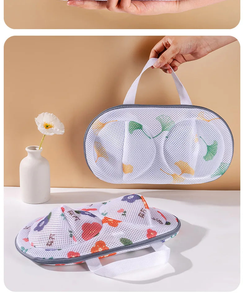 A white mesh laundry bag with a handle is shown being held and laid out on a surface.