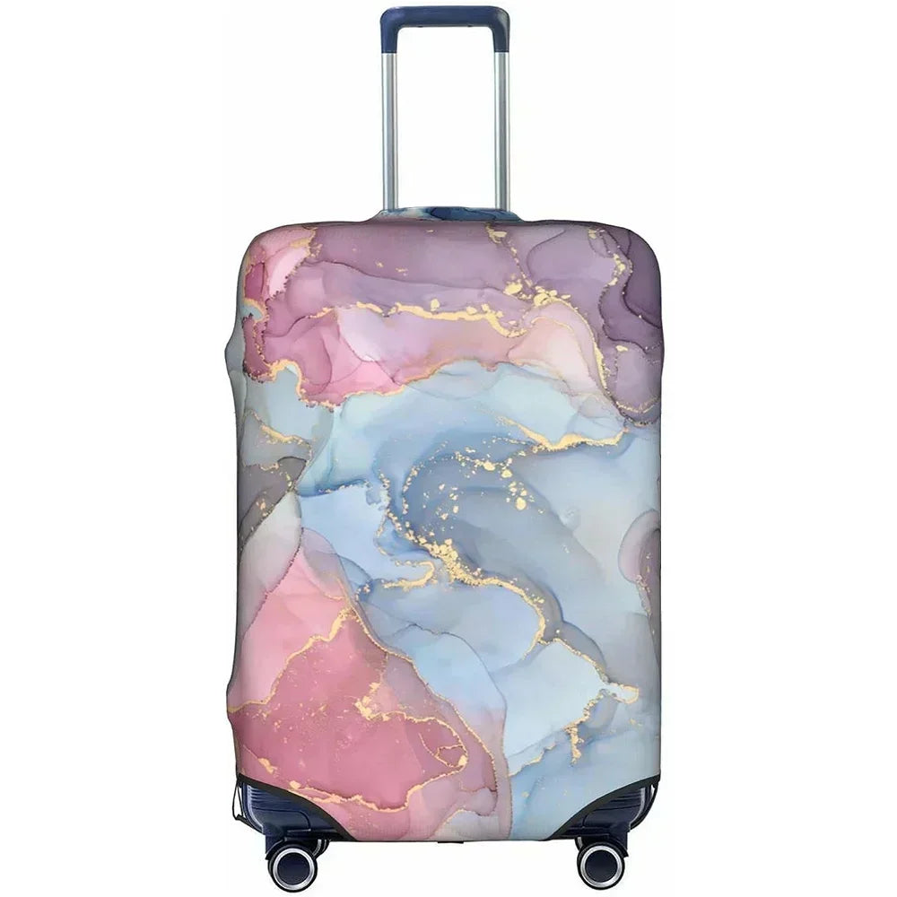 A suitcase with a marbled pink and blue watercolor design featuring gold accents.