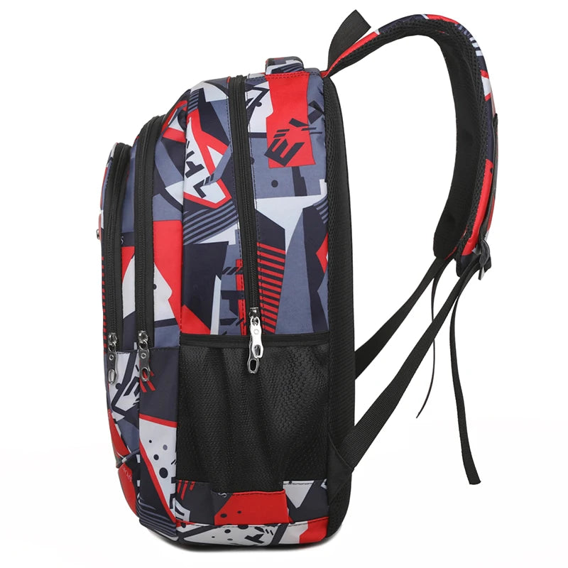 A black laptop backpack featuring a geometric pattern of red, white, and blue fabric.