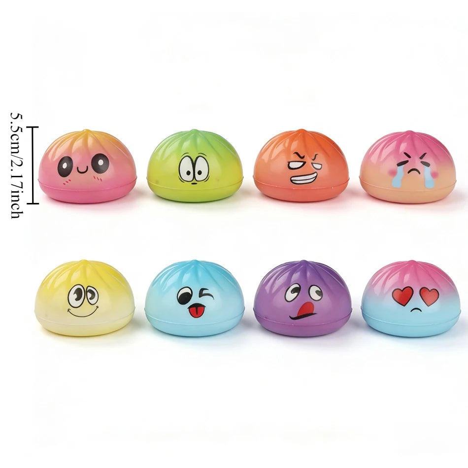Collection de jouets anti-stress squishy colorés dans diverses nuances pastel et expressions.