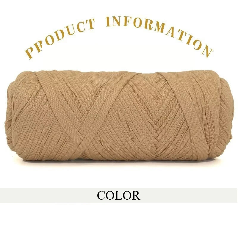 A skein of thick beige polyester blend yarn coiled for knitting and crochet projects.