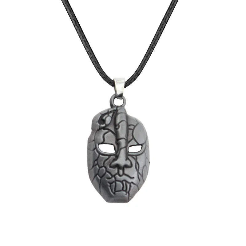 A pendant necklace featuring a black stone mask design from JoJo's Bizarre Adventure Red Stone of Aja.