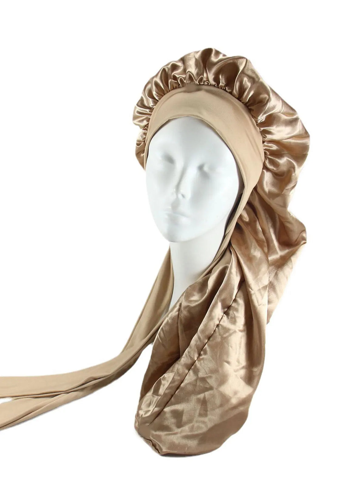 A beige satin sleep bonnet draped around a white mannequin head.