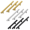 Eine Sammlung von Schrankgriffen in gebürstetem Nickel und Gold-Optik aus der Seite gezeigt.