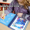 A child is holding and looking at a blue water drawing book for kids.