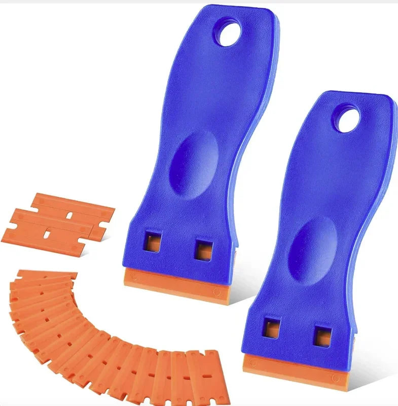 A set of blue razor blade scrapers with orange blades for removing adhesive, vinyl, and ceramic.