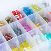 Clear plastic storage box filled with various car blade fuse assortment kits and tools.