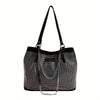 A black crystal-embellished chain shoulder bag with a textured surface and gold-toned chain details.