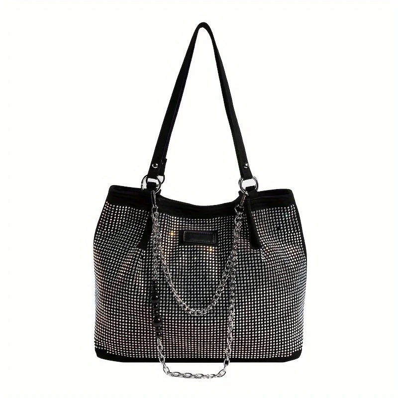 A black crystal-embellished chain shoulder bag with a textured surface and gold-toned chain details.