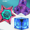 A set of magnetic fidget cubes showing various geometric shapes and colors, including purple, pink, cyan, and blue.