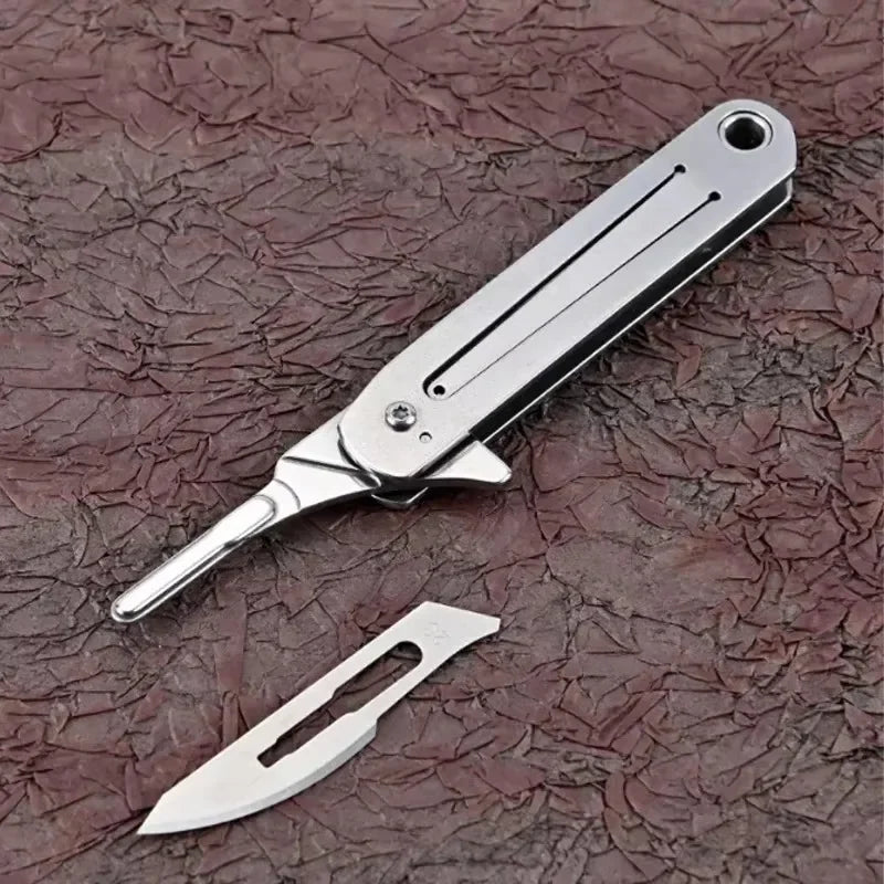 Compact Stainless Steel Folding Knife with Keychain