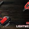 A hand holds a red cordless handheld turbo blower, demonstrating its compact and lightweight design.