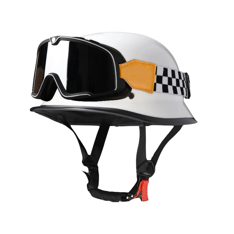 White half helmet with black goggles and an orange and black checkered strap for motorcycle riding