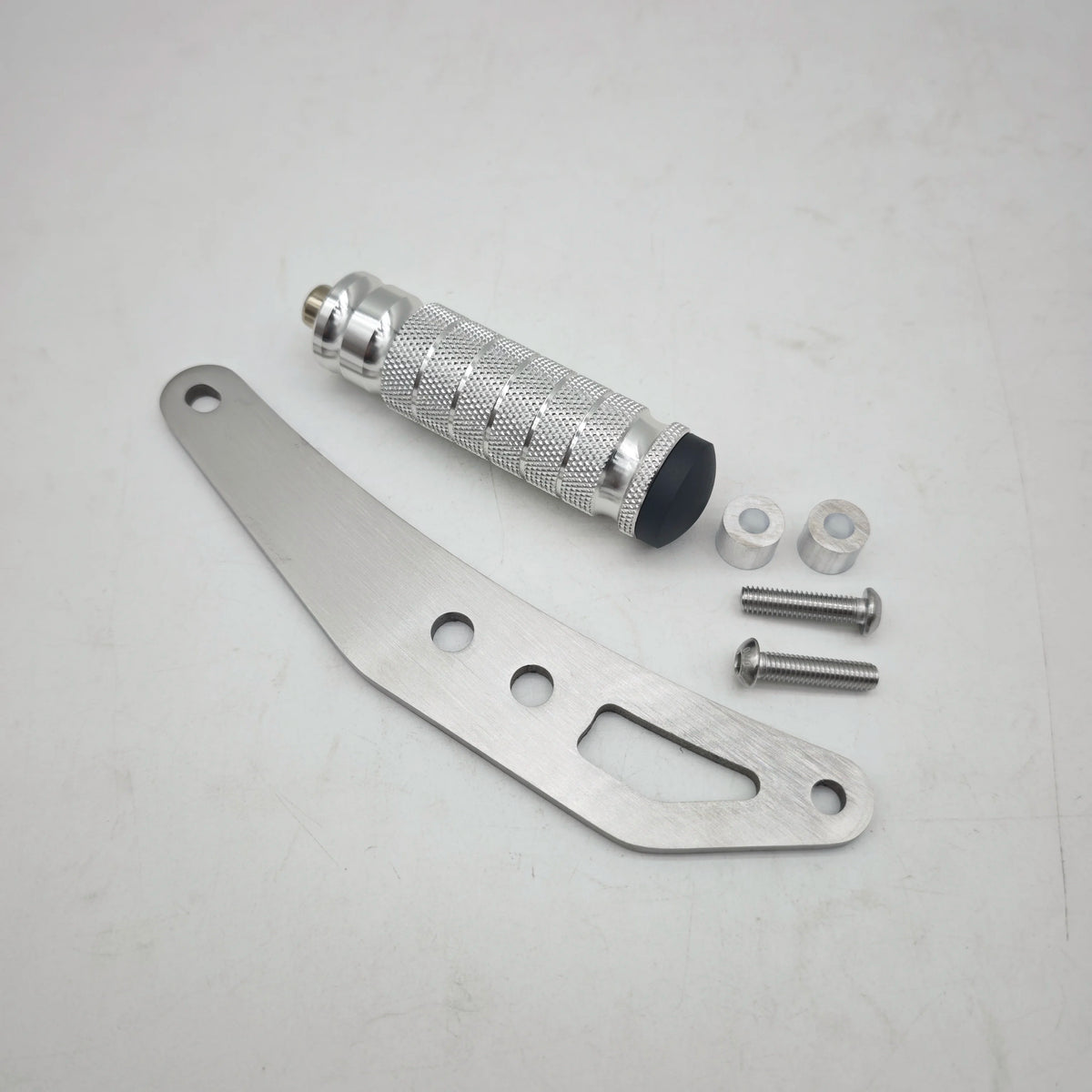 CNC aluminum foot pegs and mounting hardware for electric dirt bikes