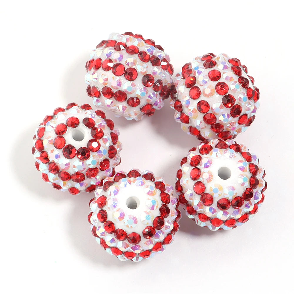 A set of five resin rhinestone beads with a two-tone striped design, featuring red and white colors.
