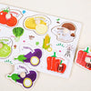 A wooden alphabet and number peg puzzle set featuring various colorful vegetables like tomato, potato, lettuce, eggplant, and