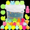 A collection of colorful, glow-in-the-dark squishy toys shaped like various cute animals in a clear plastic container.