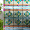 Frosted stripe privacy window film featuring geometric patterns in teal, pink, and brown tones.