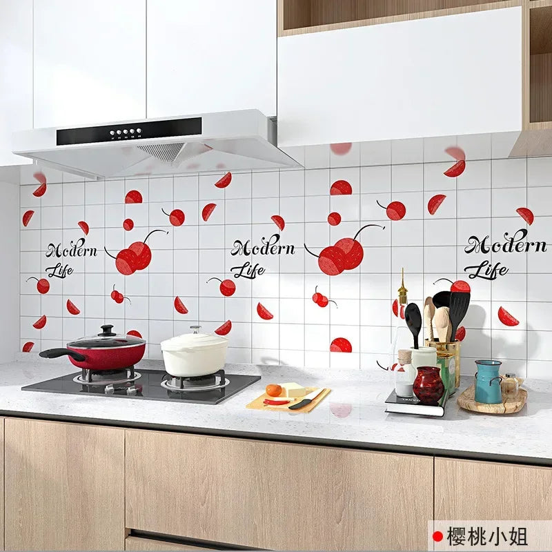 Modern life kitchen splashback featuring red leaf-shaped stickers on a white tiled wall.