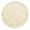 A bowl filled with white natural soy wax granules for DIY candle and skincare making.