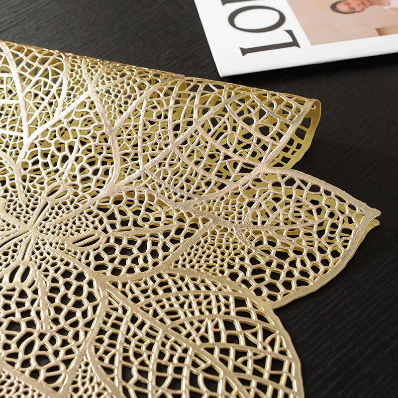 Gold ornate PVC table runner and placemat set featuring intricate floral lace design