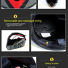 A black full-face motorcycle helmet showing various features including the air inlet, removable lining, and safety buckle.