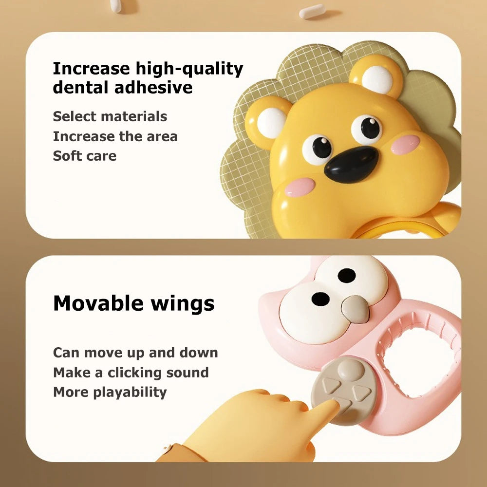 A yellow bear-shaped baby crib mobile with soft, movable wings and a pink frame.