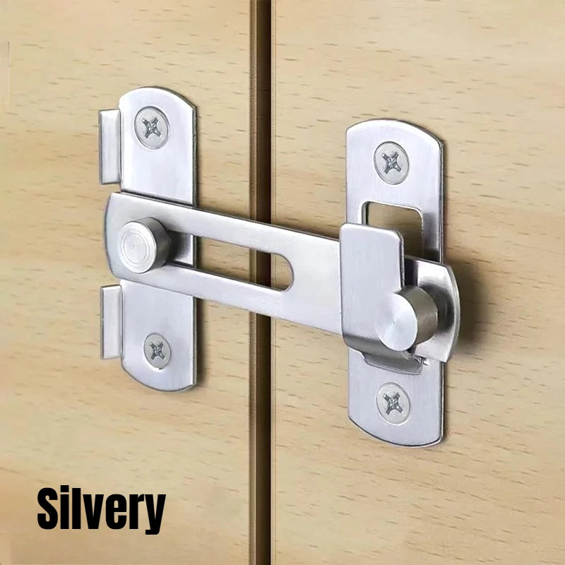 A silvery stainless steel sliding door latch lock installed on a light wood panel.