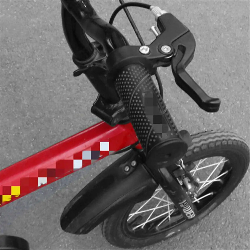 Black universal bike V-brake levers with an ergonomic grip mounted on a bicycle frame.