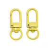 A pair of yellow alloy lobster clasp hooks for DIY jewelry making