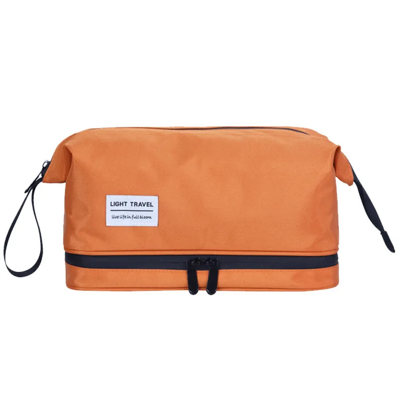 An orange men's travel toiletry bag with a black strap and a zippered compartment.
