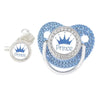 A set of crystal rhinestone pacifier chain clips with silicone nipples and a blue gemstone-like clip.